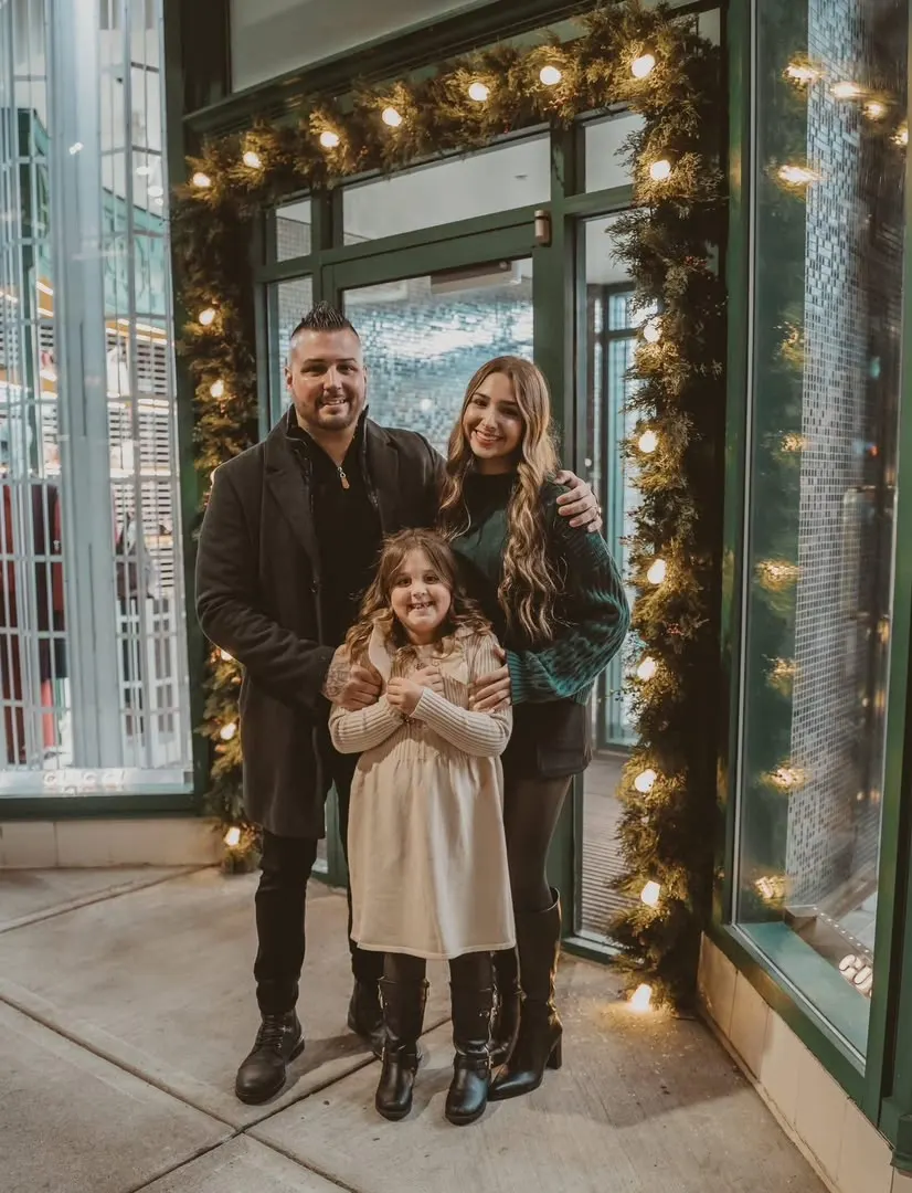Tony Marchetti with his wife and daughter