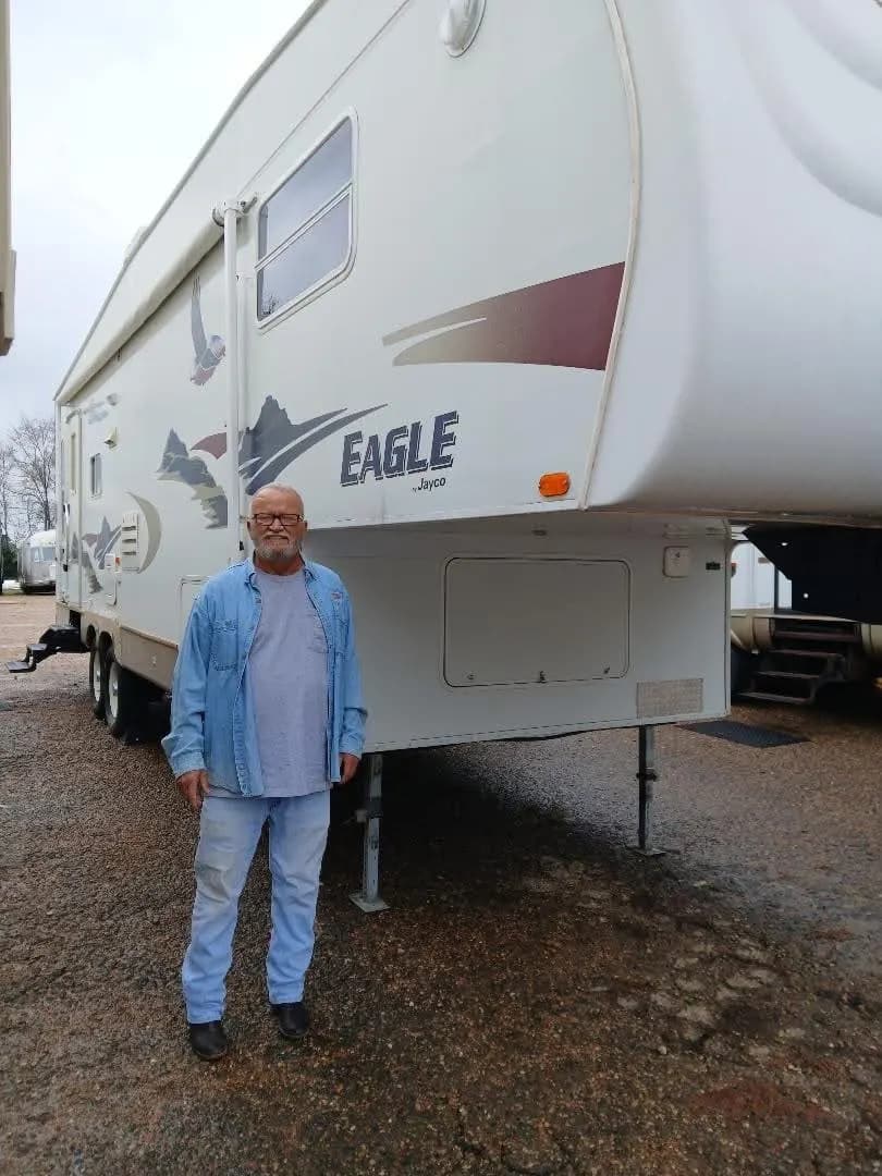 Customer in front of his Jayco Eagle fifth wheel